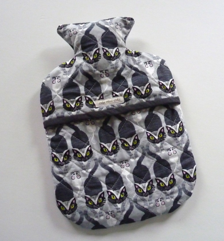 Cosy cat hot water bottle cover