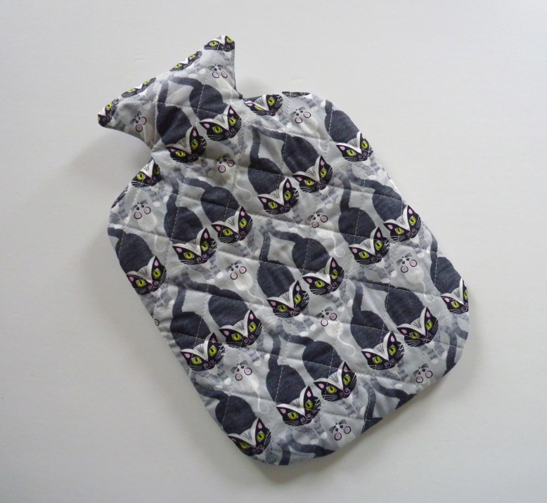 Cosy cat hot water bottle cover