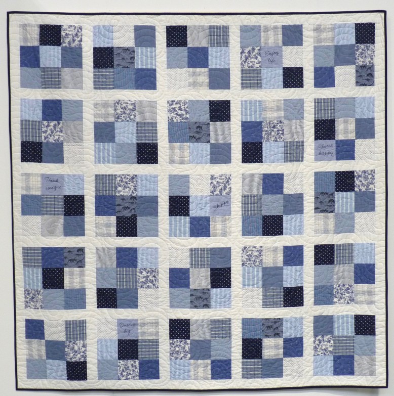 Quilt made from upcycled blue and white shirts