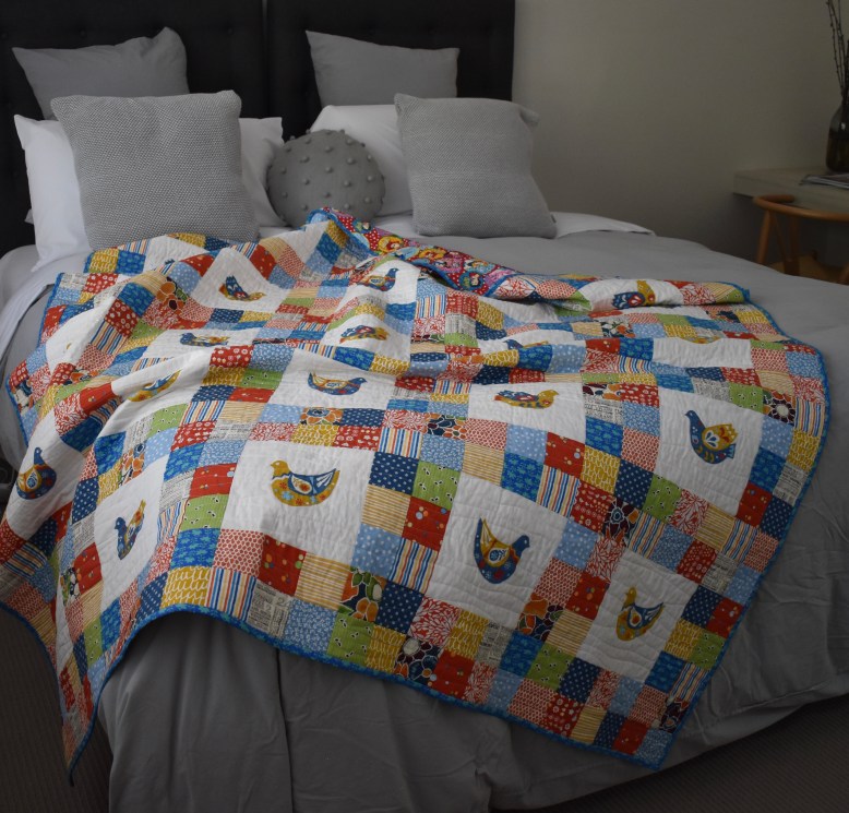 Scandi bird patchwork quilt