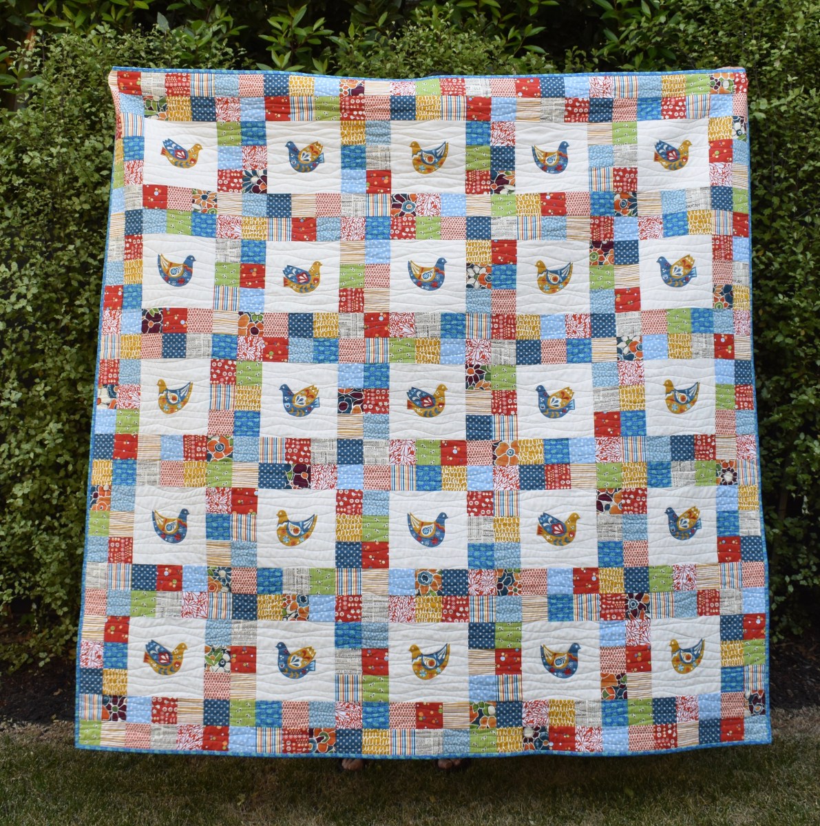 Scandi bird patchwork quilt